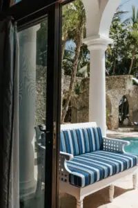 two seater sofa near a pool