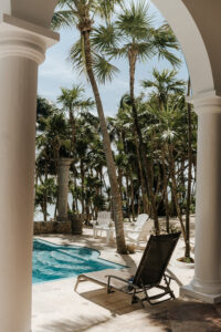 a relaxing chair near a swimming pool