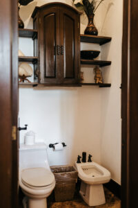 two commodes in a washroom of a villa