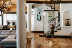 living room and attached kitchen area in a villa