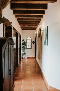 a passage in a villa with Devil's ivy Plant