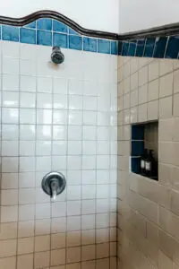 a bathroom with shower and shower gel