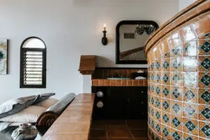 a shower area attached to a bedroom