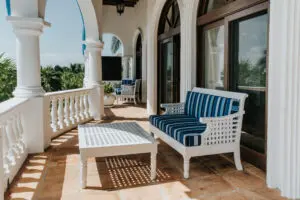 two seater sofa and a table in a balcony