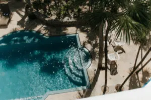 aerial view of a huge swimming pool and chairs