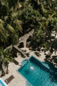 aerial view of water falling into a pool