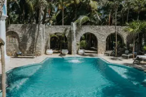 a large swimming pool with water being filled into it