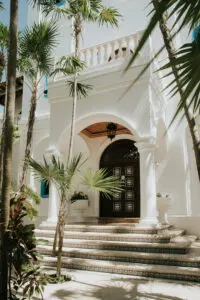 entrance of a beach villa with trees